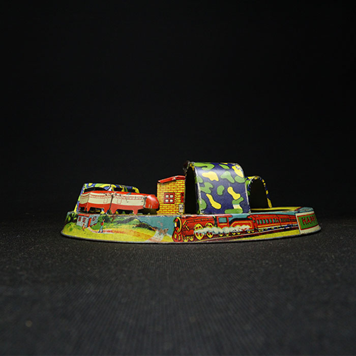 happy express tin toy train side view