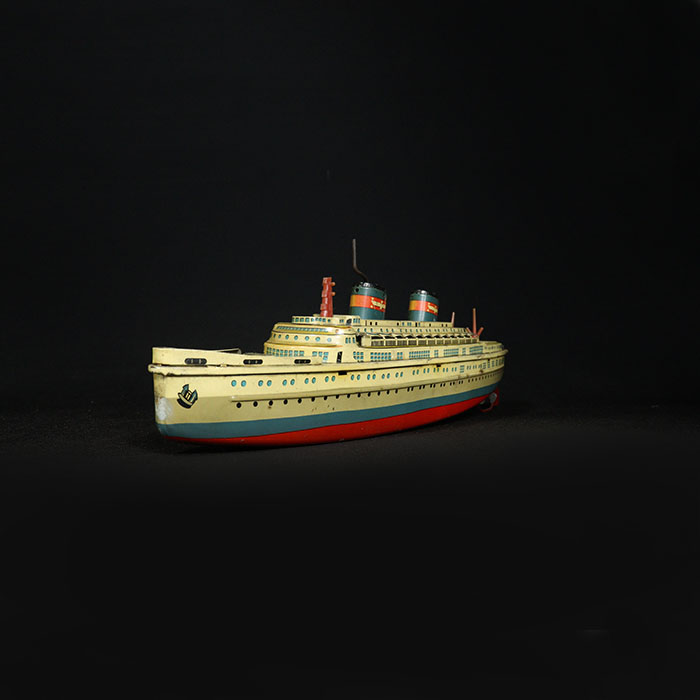 tin toy cruise ship half side view 2