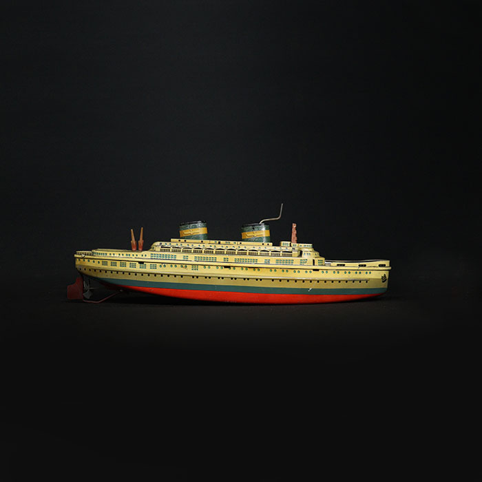 tin toy cruise ship side view 2