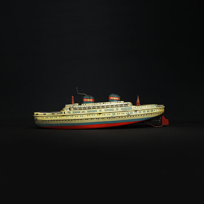 tin toy cruise ship side view