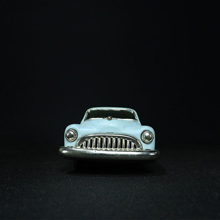 vintage friction tin toy car front view