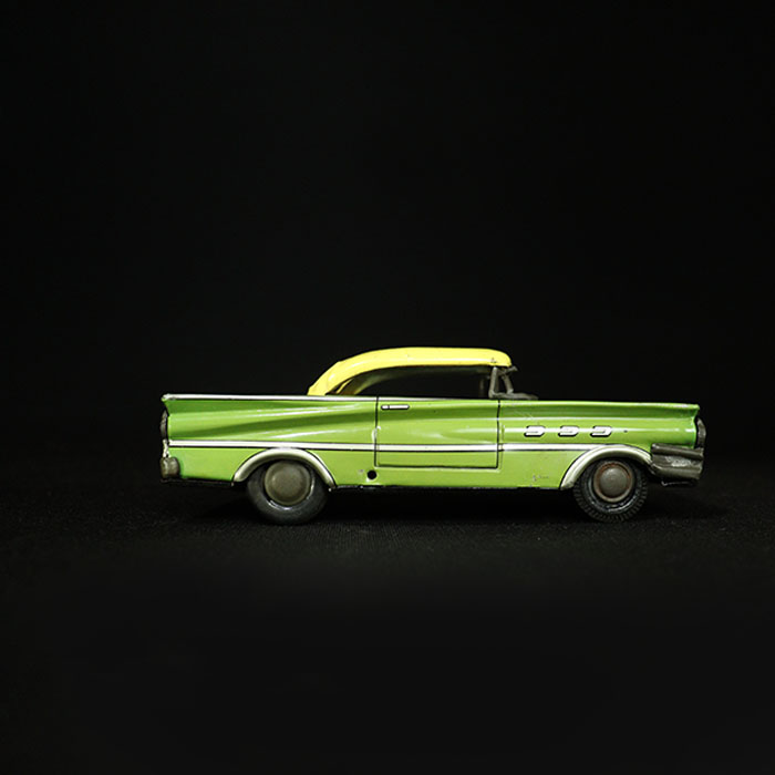 vintage tin toy buick car side view