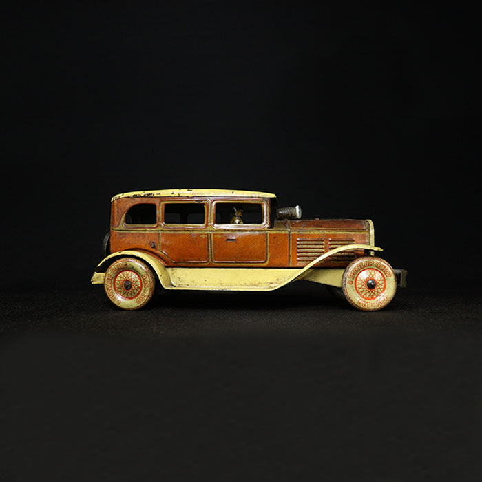 vintage tin toy car side view
