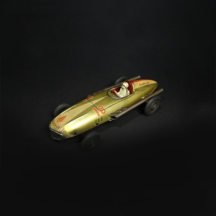 vintage tin toy golden jet car side view 3