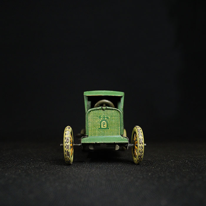 vintage tin toy lehmann sedan car front view