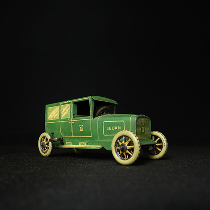 vintage tin toy lehmann sedan car side view