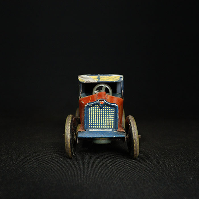vintage tin toy sedan car front view