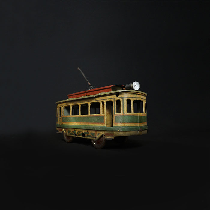 vintage tin toy tram train half side view 2