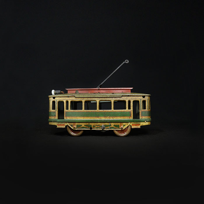 vintage tin toy tram train side view