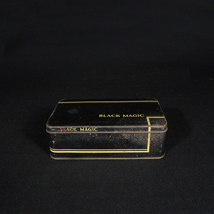 black magic tin box front view