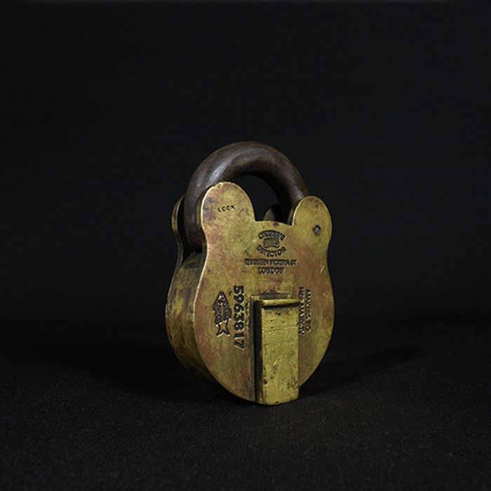 chubbs detector padlock bronze collectible half side view